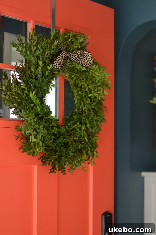 Festive front door wreath welcoming guests to a holiday home