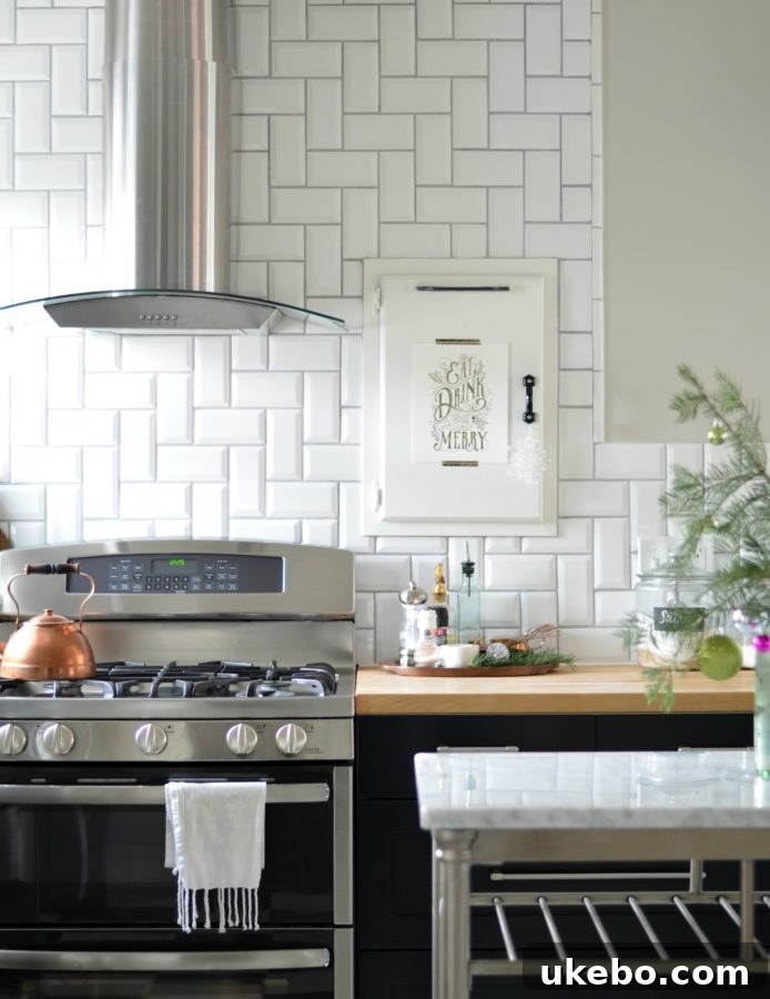 Stove area in a holiday kitchen, featuring festive accents and simple decor