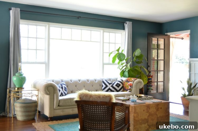 Classic Chesterfield sofa and iconic Eames lounge chair, vintage home decor finds