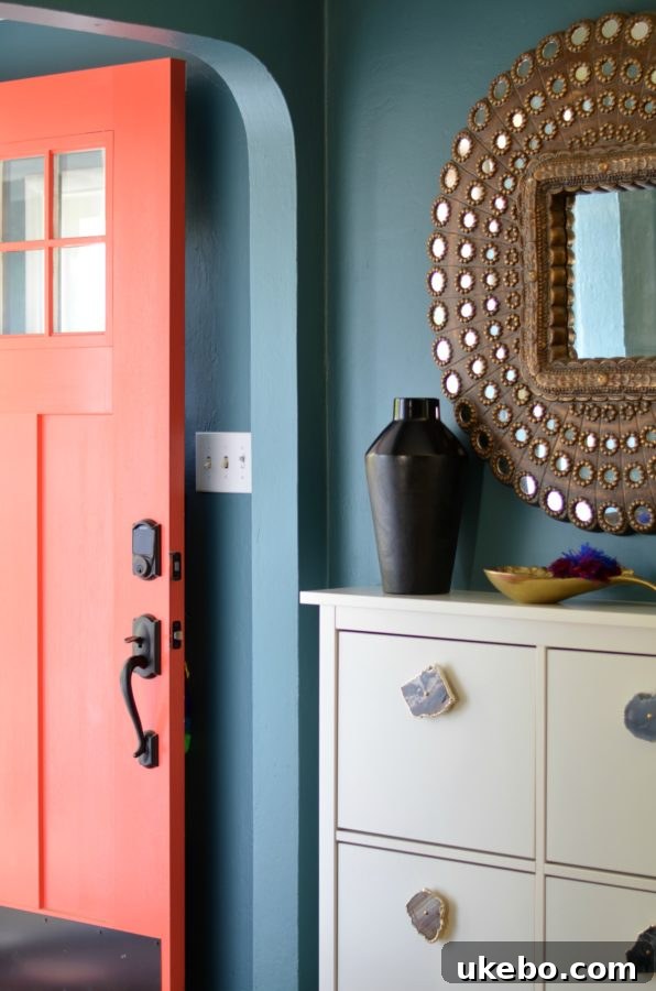 A warm and inviting entry area, hinting at the vibrant boho-eclectic style within the cottage bungalow.