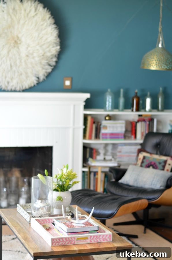 Another view of the living room, focusing on the interplay of natural light and the carefully selected furniture pieces.