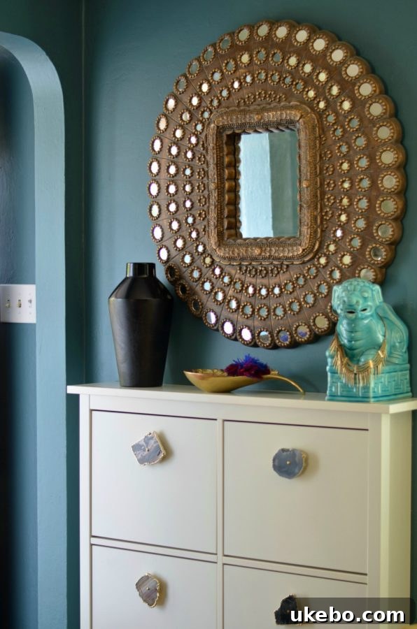 A curated entry vignette, welcoming guests with a glimpse of the home's distinctive style and personality.