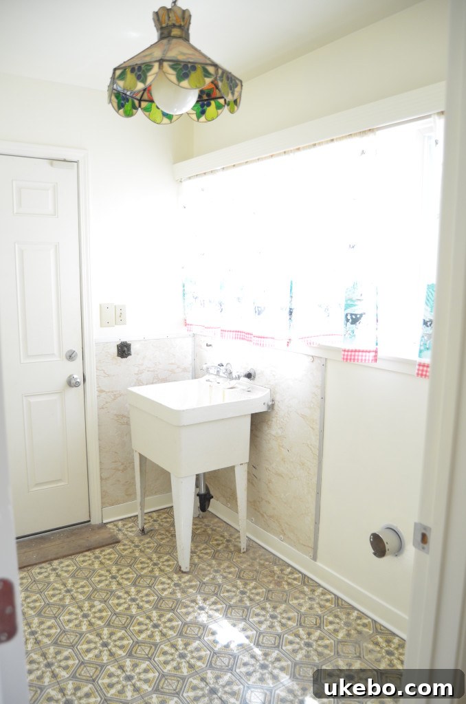 Current state of the laundry room before renovation