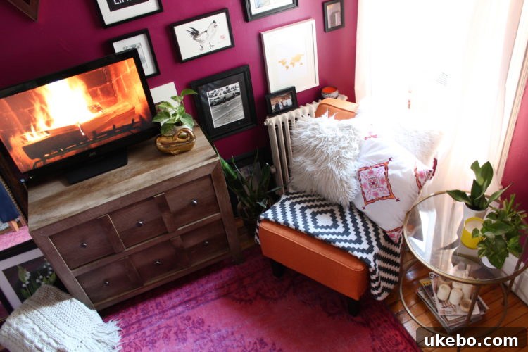 A bright and inviting corner of Megan's small NYC apartment, featuring personal decor touches.