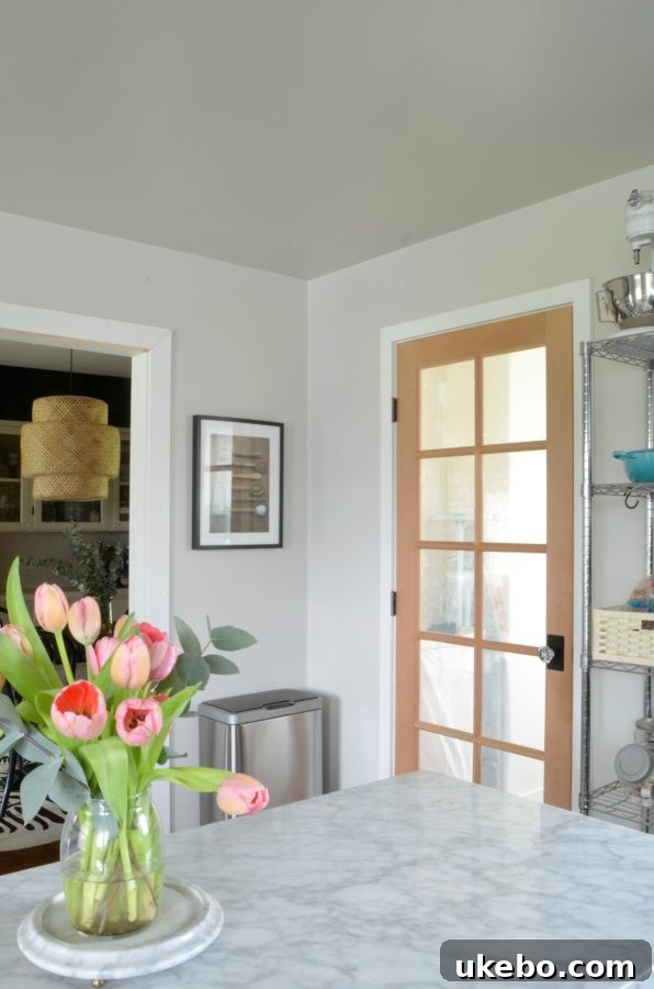 Close-up of kitchen island storage with decorative baskets