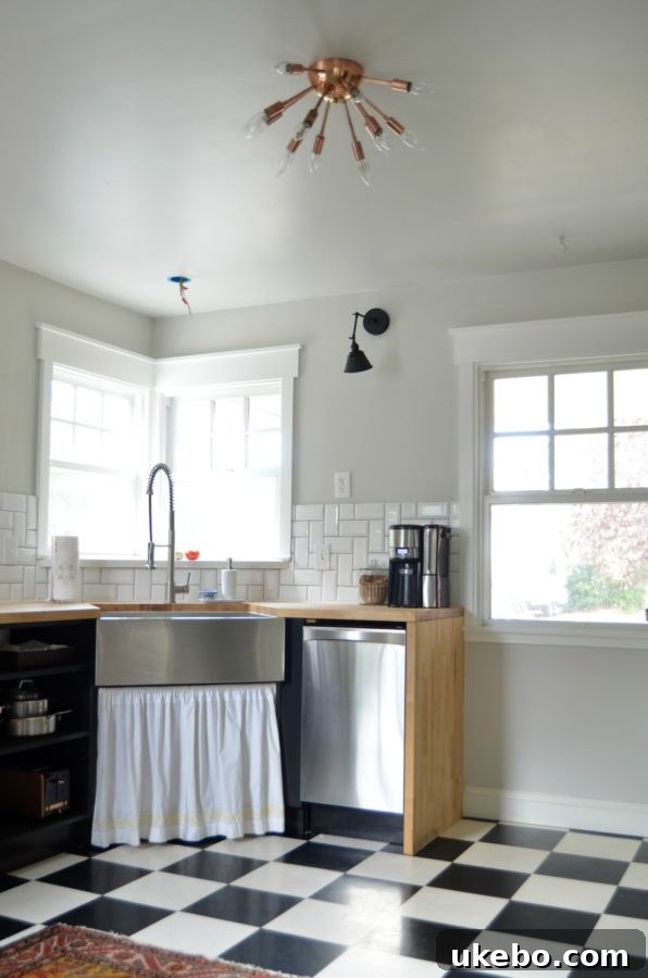 Previous kitchen layout, showcasing bare walls