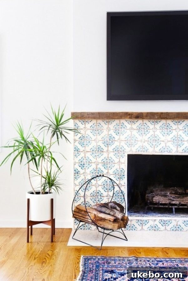 Elegant living room with a white fireplace featuring intricate blue and white patterned tiles