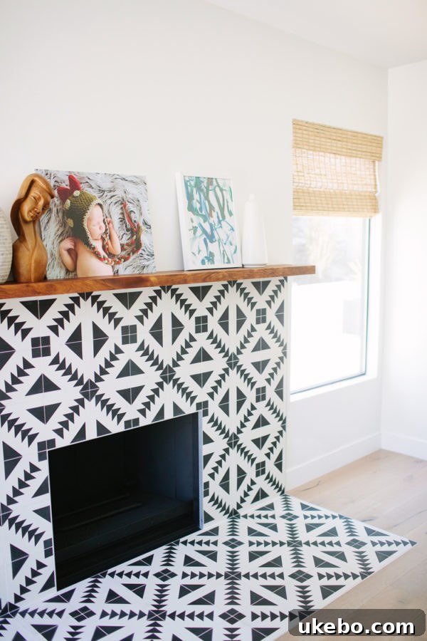 Contemporary fireplace with unique green geometric patterned tiles