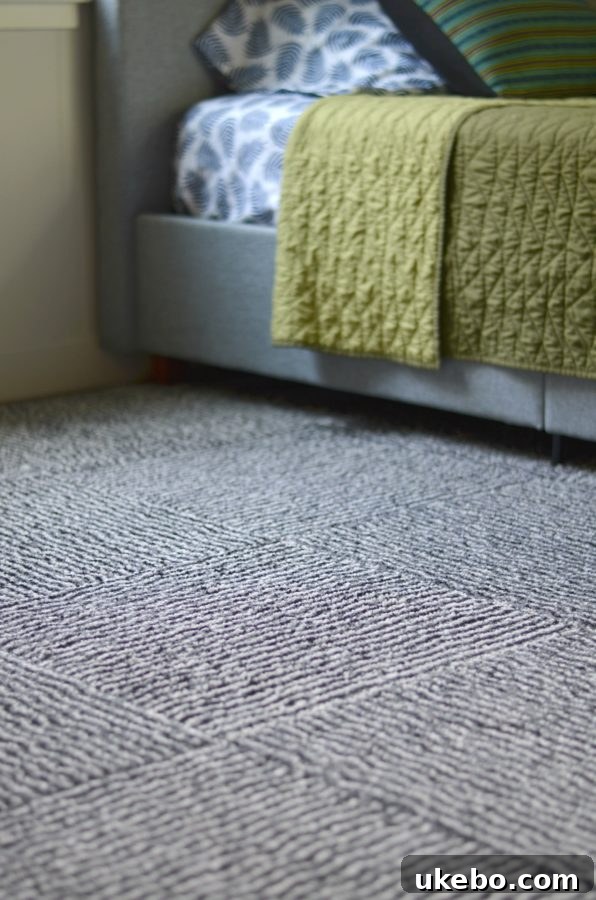 FLOR carpet tiles laid in a parquet style in the boy's bedroom