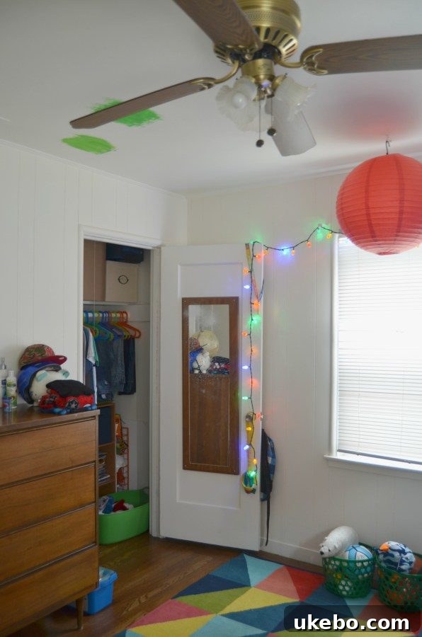 Close up of paint swatches on the ceiling of a boy's room