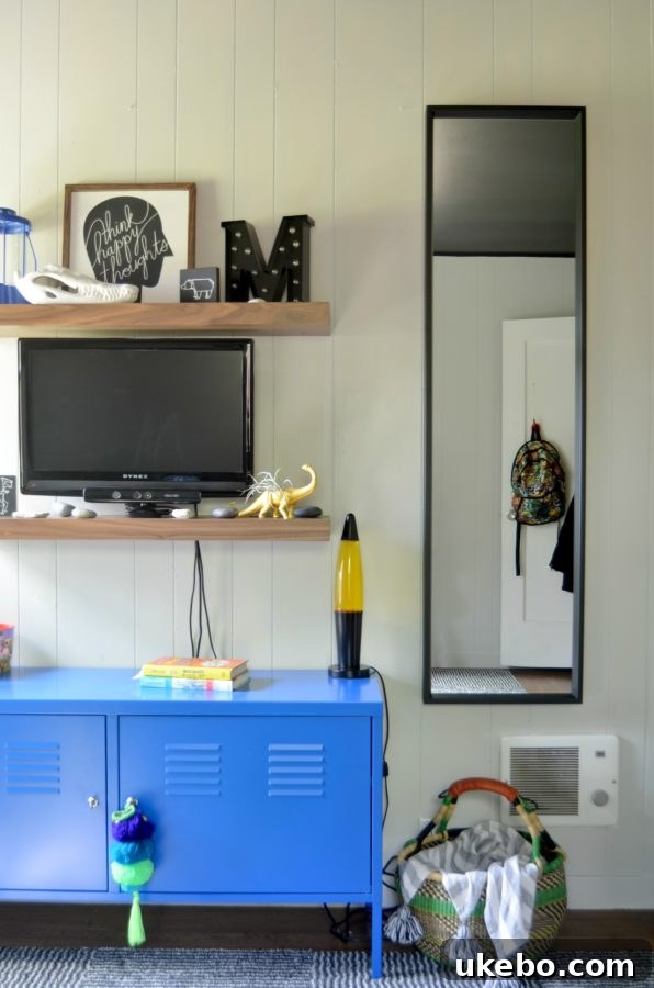 Corner of the room showcasing the new paint colors and a glimpse of decor