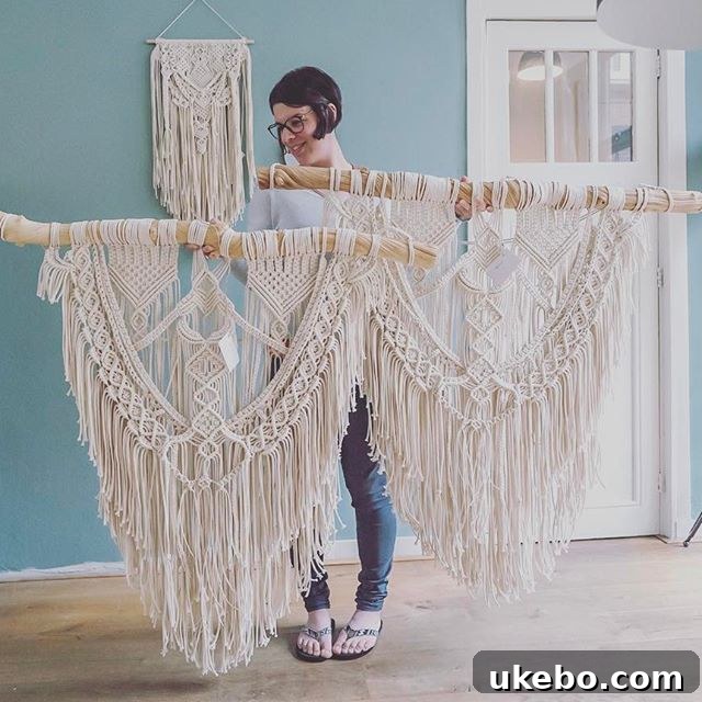 Stunning layered macrame wall hanging by Mini Swells, showcasing diverse textures and a dynamic, fluid design.