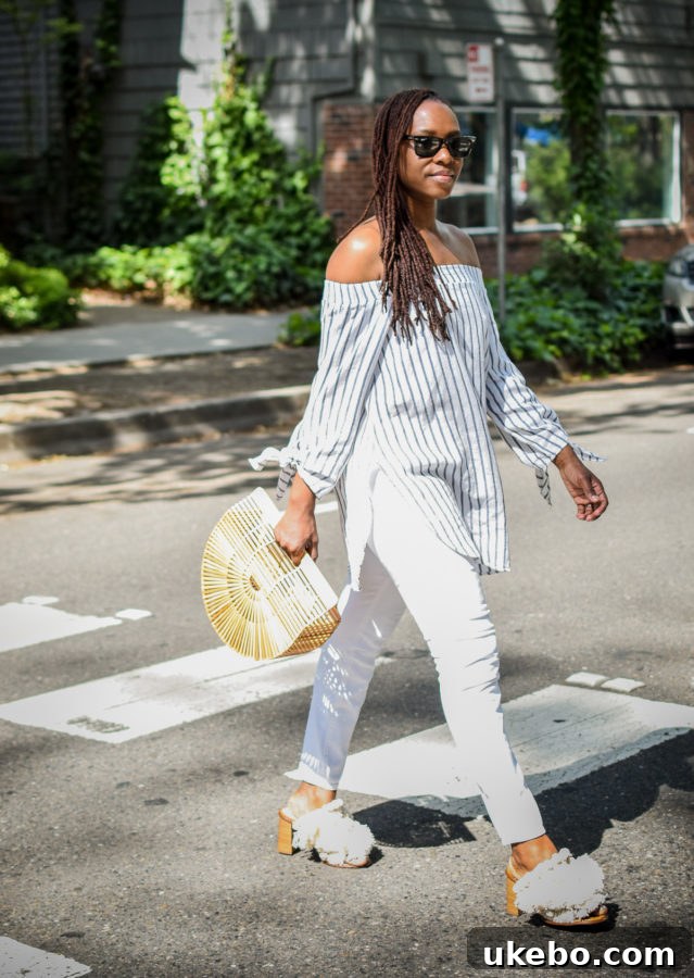Shavonda smiling confidently, embodying her new direction in blogging and personal style