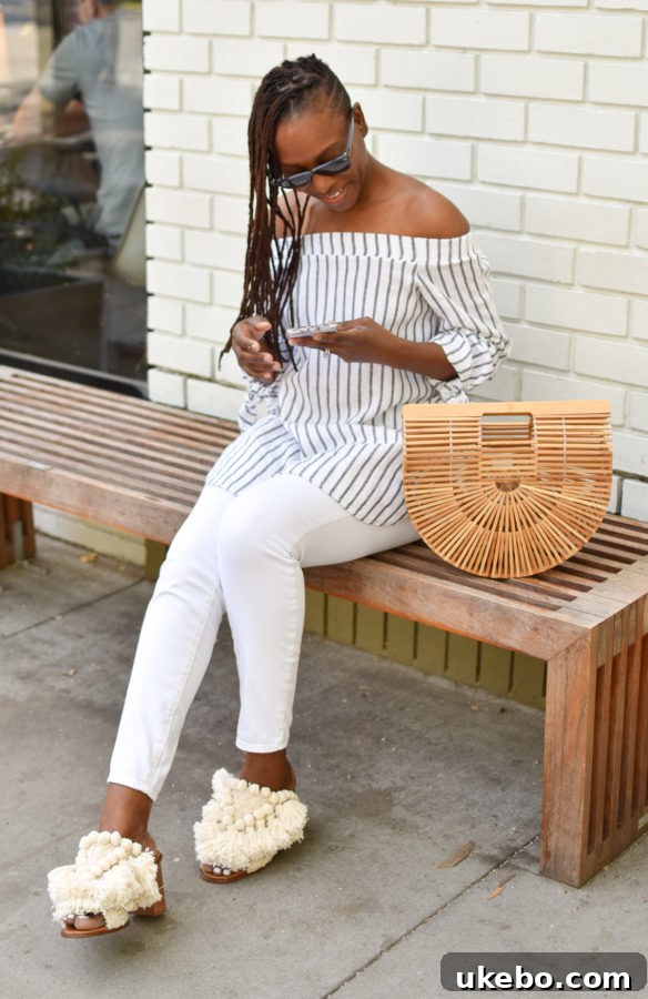 Shavonda posing with her new bag and shoes, highlighting her transition to lifestyle blogging