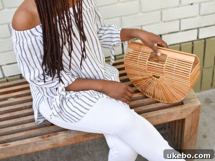 Another perspective of Shavonda's complete fashion look, featuring the Cult Gaia bag