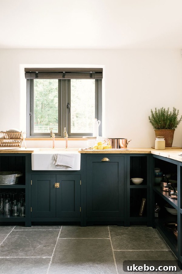 Jewel tone green kitchen cabinets