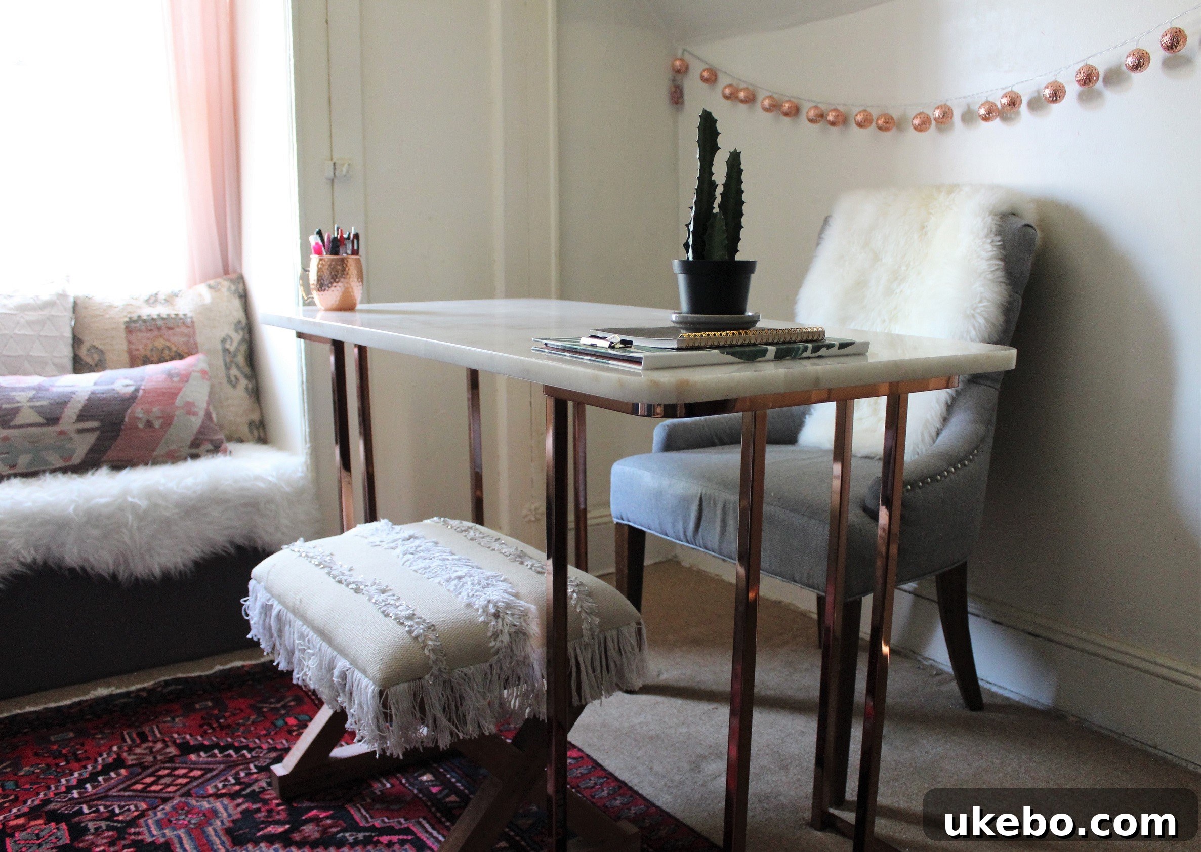 A cozy corner of Nusaiba's attic, featuring a sofa bed and projector for entertainment.