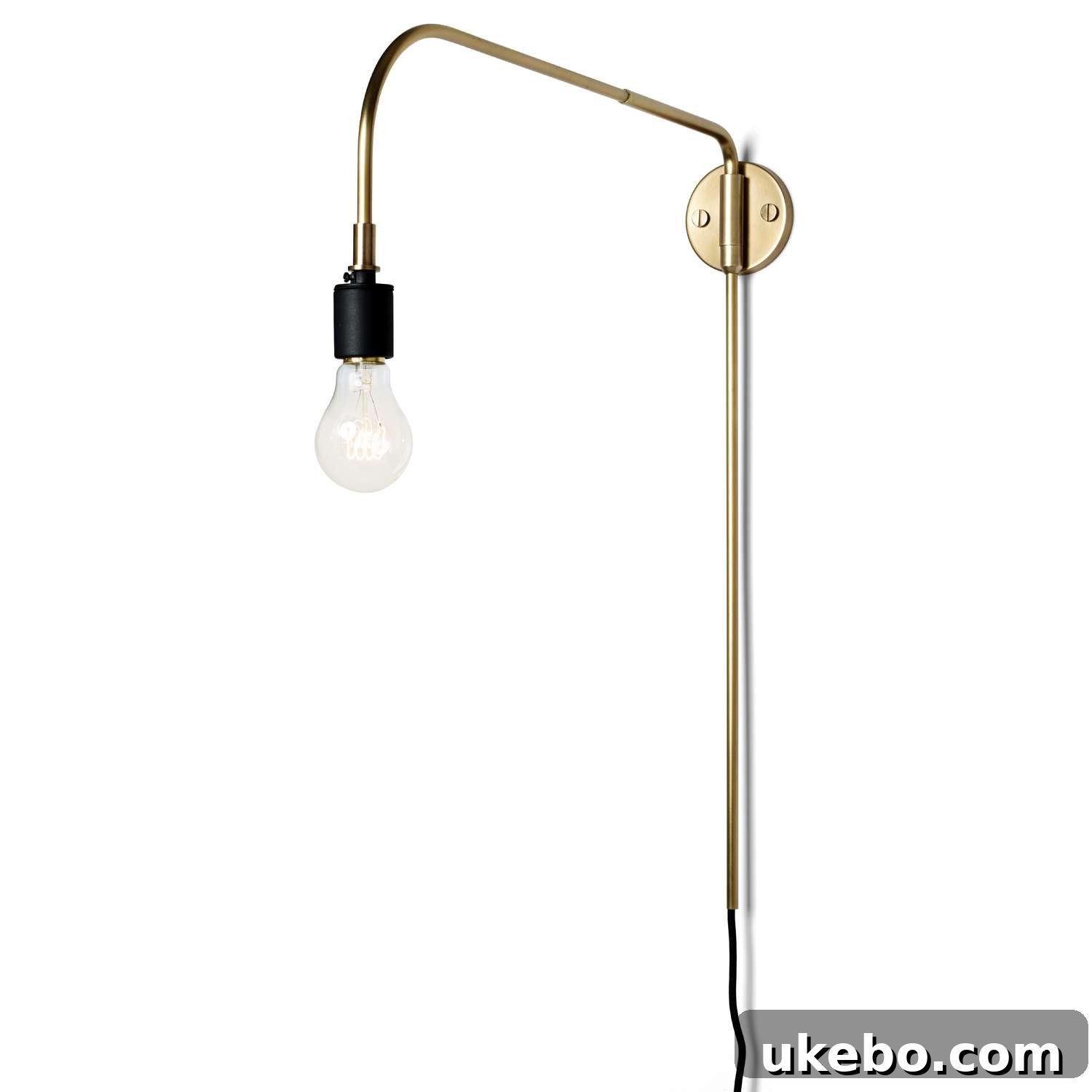 The sleek design of the Menu Warren Wall Sconce by YLighting, perfect for modern bedroom lighting.