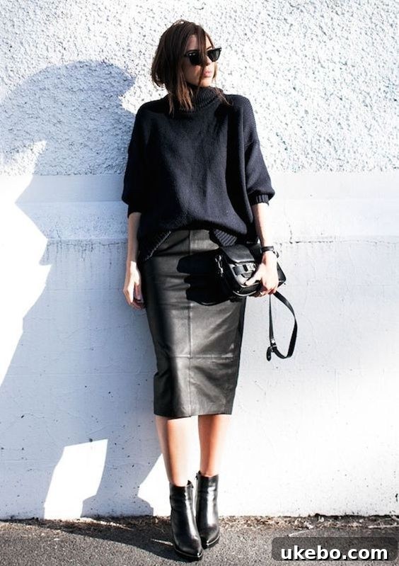Mastering Your Small Closet My 5 Fall Winter Capsule Wardrobe Essentials 7 Woman wearing a chic black leather pencil skirt