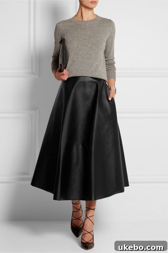 Mastering Your Small Closet My 5 Fall Winter Capsule Wardrobe Essentials 10 Model showcasing a stylish leather skirt