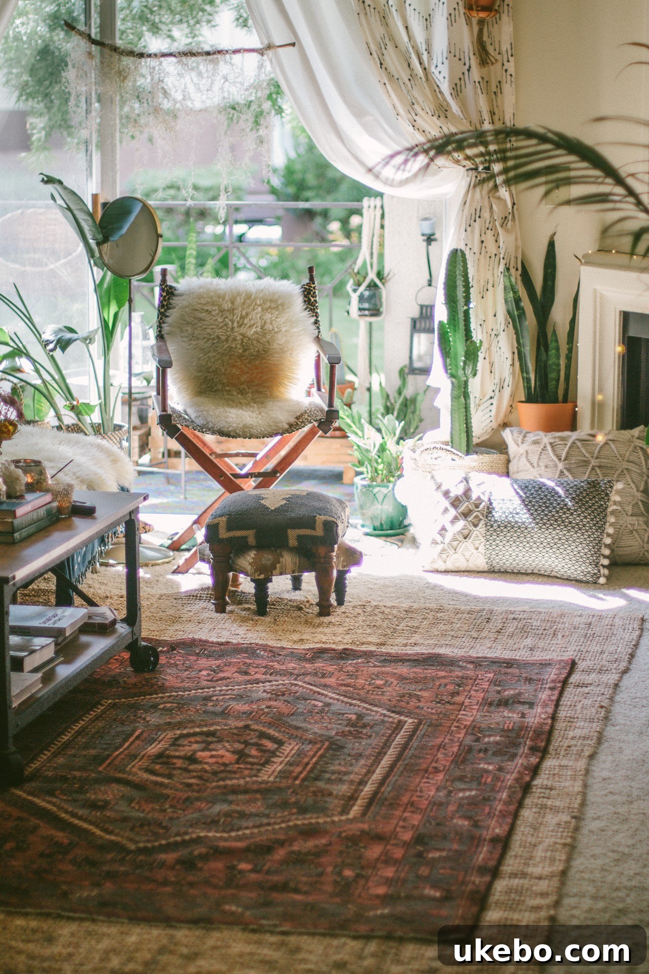 Another perspective of Sara's living room, showing a gallery wall and layered rugs