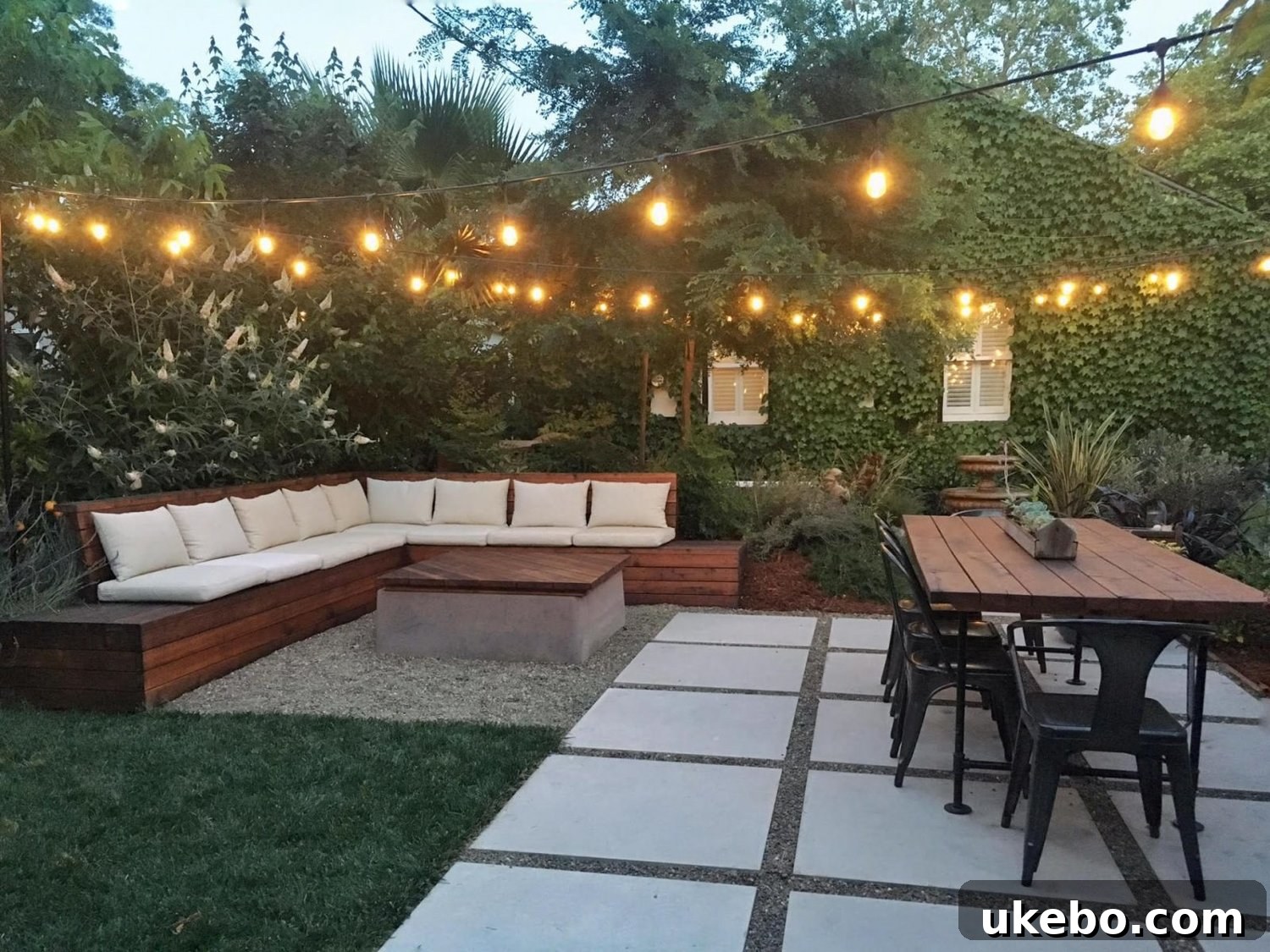 Elegant combination patio with a paver border and pea gravel infill around an outdoor lounge area