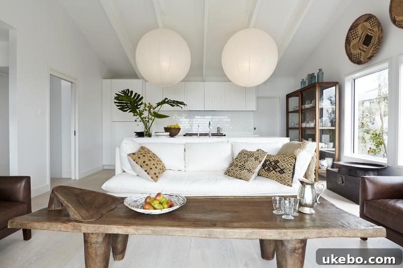 Bohemian inspired interior with a large patterned rug and wooden furniture