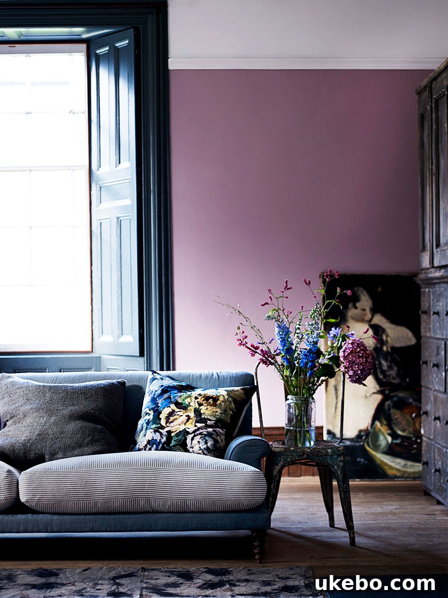 A stylish home office or reading nook featuring an accent armchair in a vibrant purple, adding a creative pop of color.