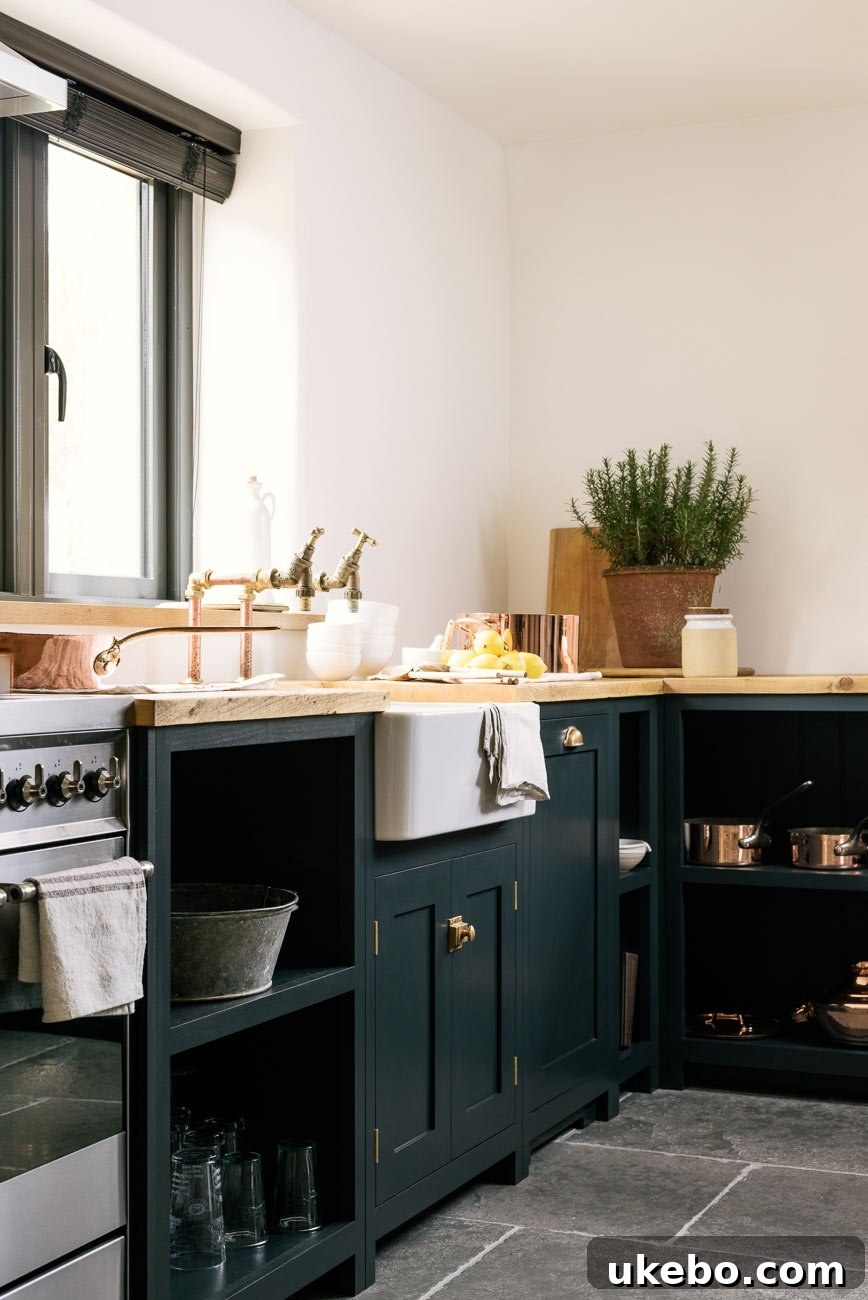 Kitchen design inspiration with dark green cabinets and wooden elements