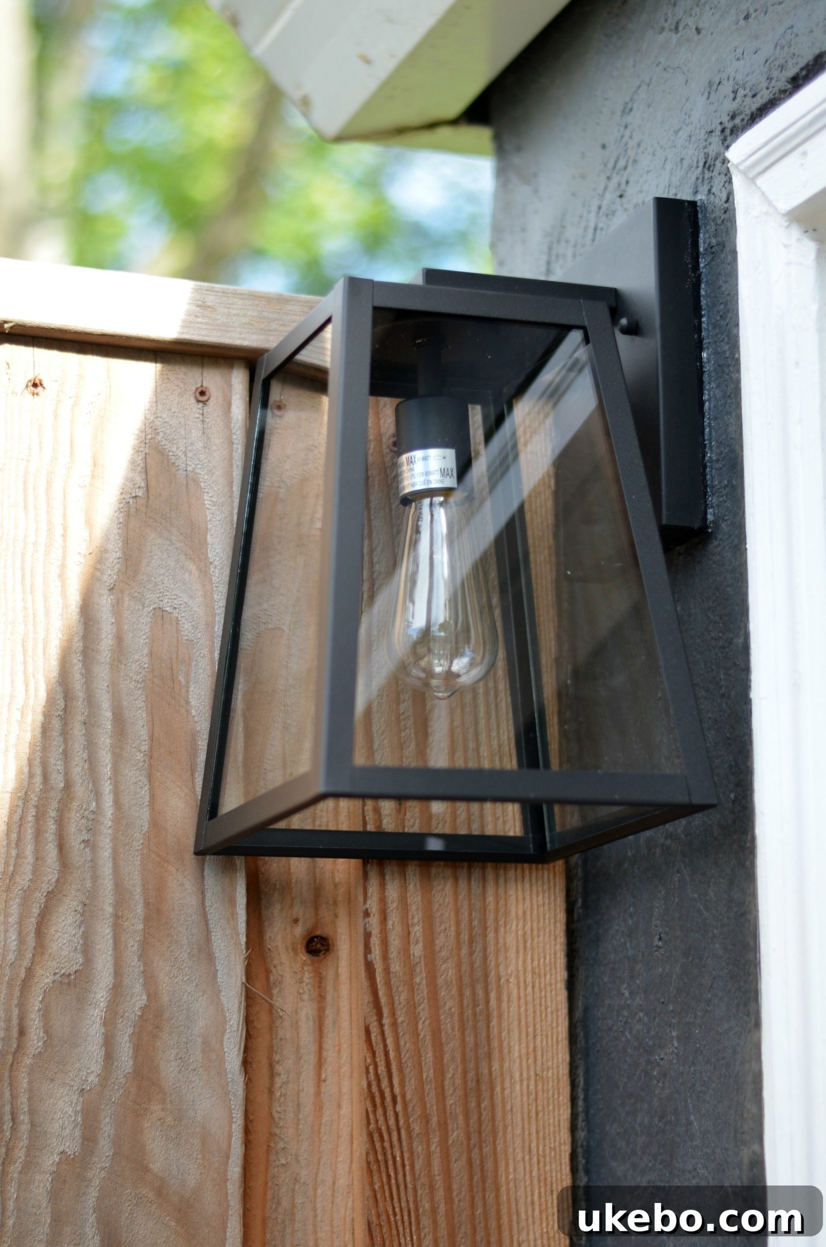 Close-up of Arrington light enhancing garage entrance