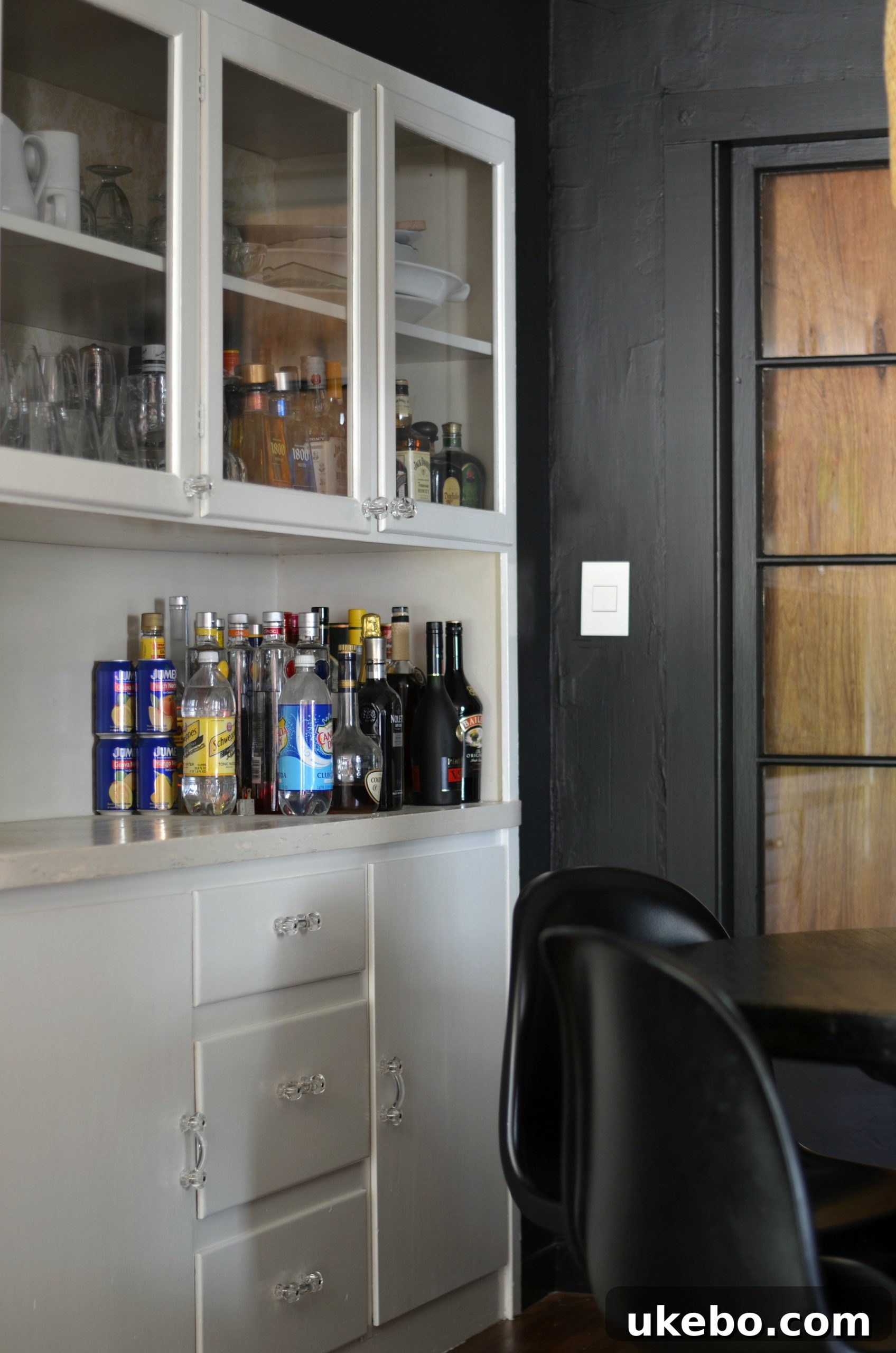 Our Cottage Bungalow Dining Room Makeover Journey 14 Dining room with all trim and barn door painted black.