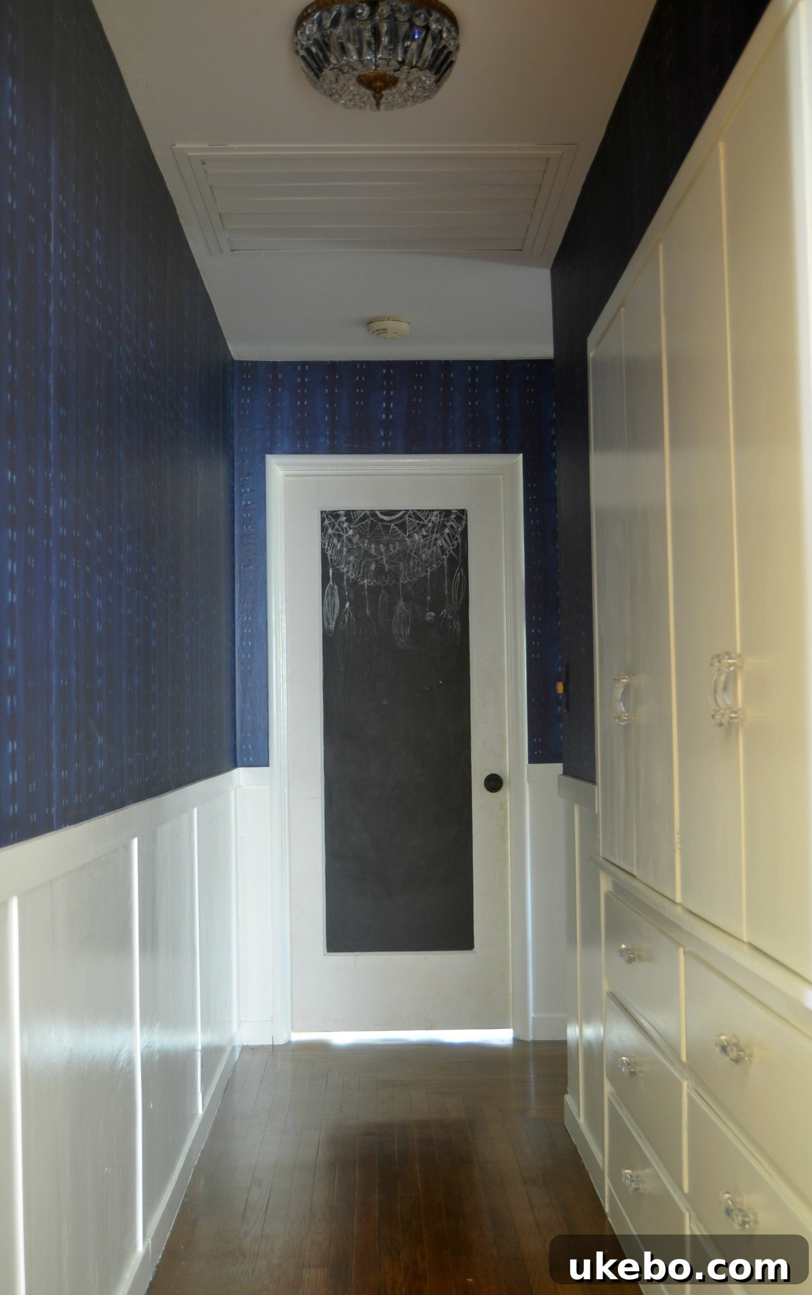 New vintage chandeliers in the hallway, inspiring the final makeover