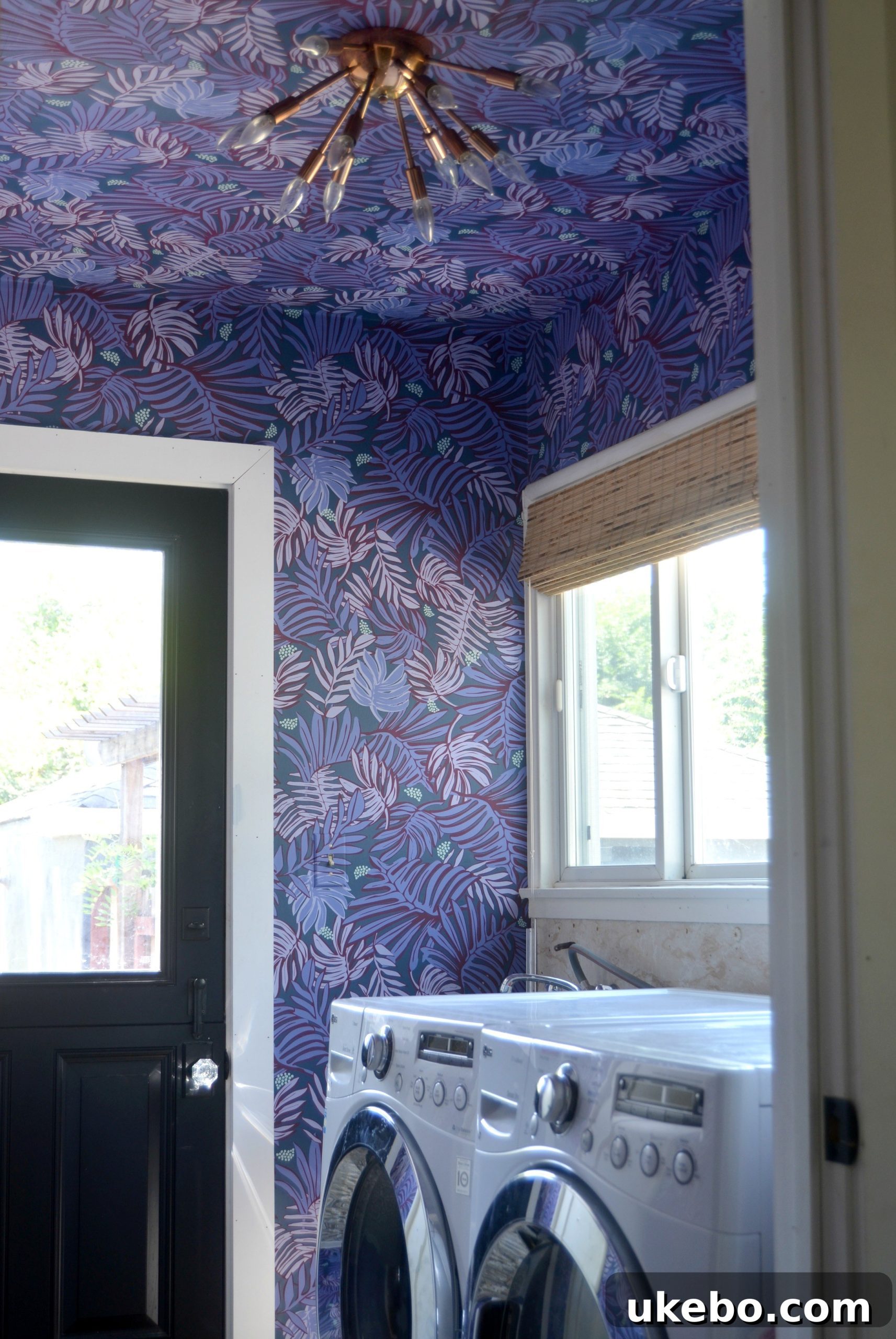 A series of images showing the recently updated laundry room with new wallpaper, lighting, and window treatments.