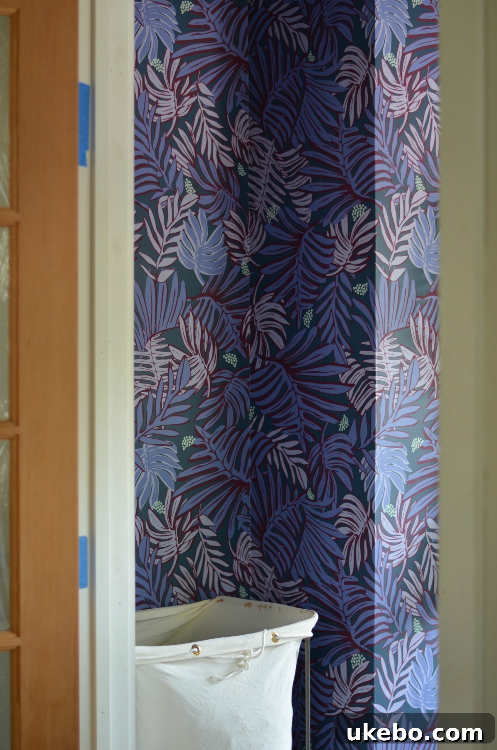Close-up of the new lighting fixture and wallpaper, showcasing the vibrant design.