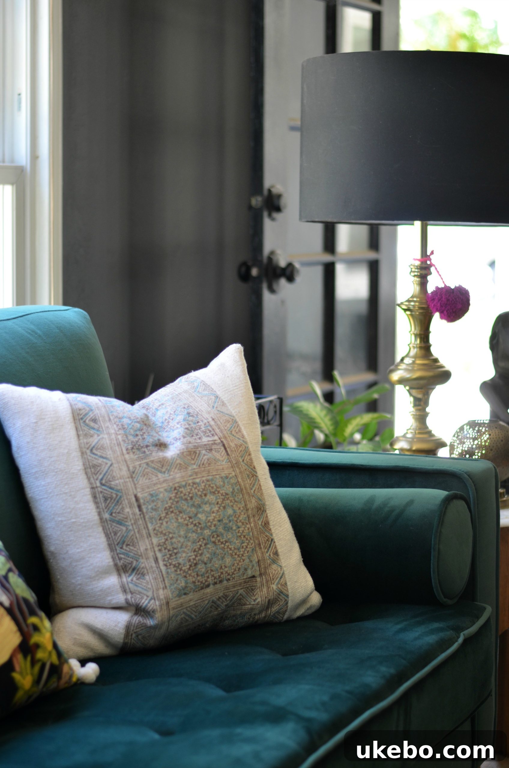 Cozy living room setup with Feather velvet sofa and coffee table