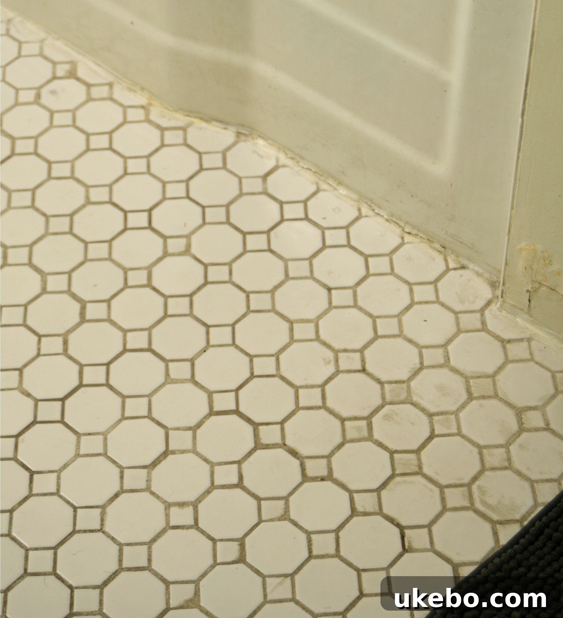 One Room Challenge Week 1 The Design Blueprint 10 Another view of the floor tiling and grout issues, including the transition