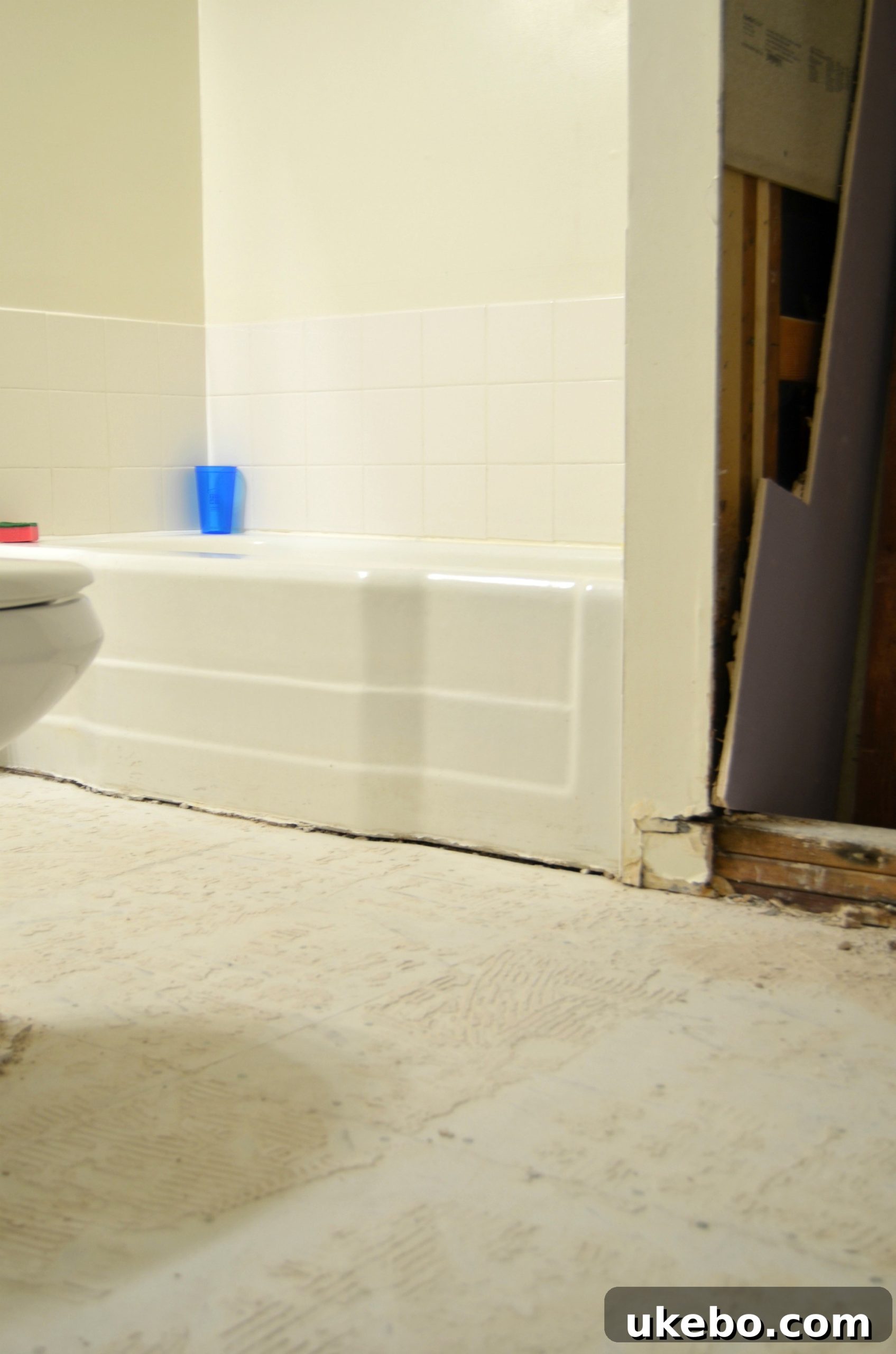 One Room Challenge Week 2: Demolition Day, Unexpected Hurdles, and Plan B 3 Bathroom floor removed, revealing subfloor
