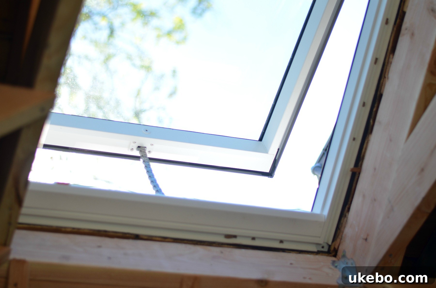 An interior shot of the Velux Solar Powered Fresh Air Skylight, showcasing its sleek design within a home.