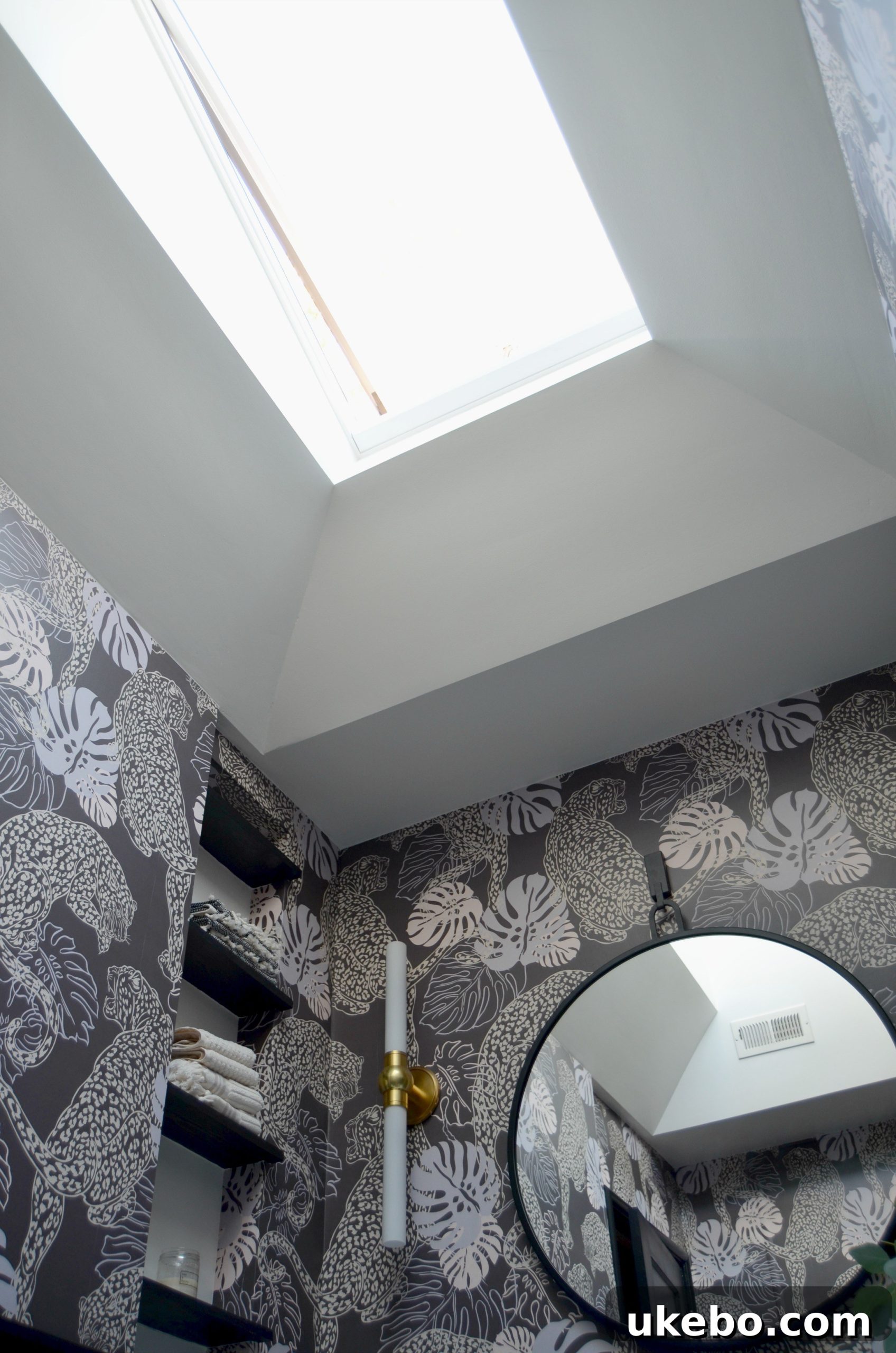 Sunlight streaming into the bathroom through the new skylight