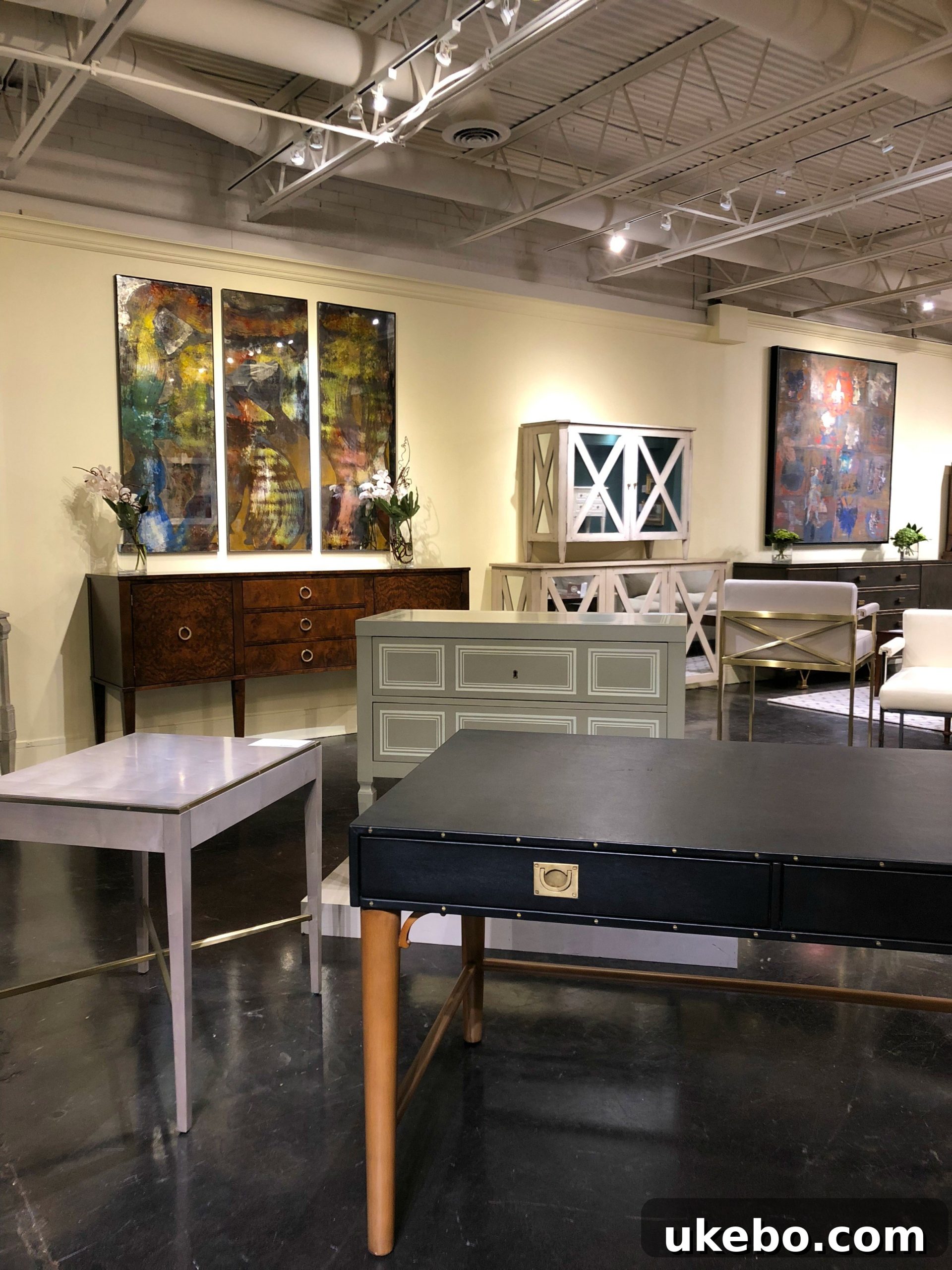 Transitional and elegant furniture from Modern History Inc. at High Point Market, blending past and present styles.