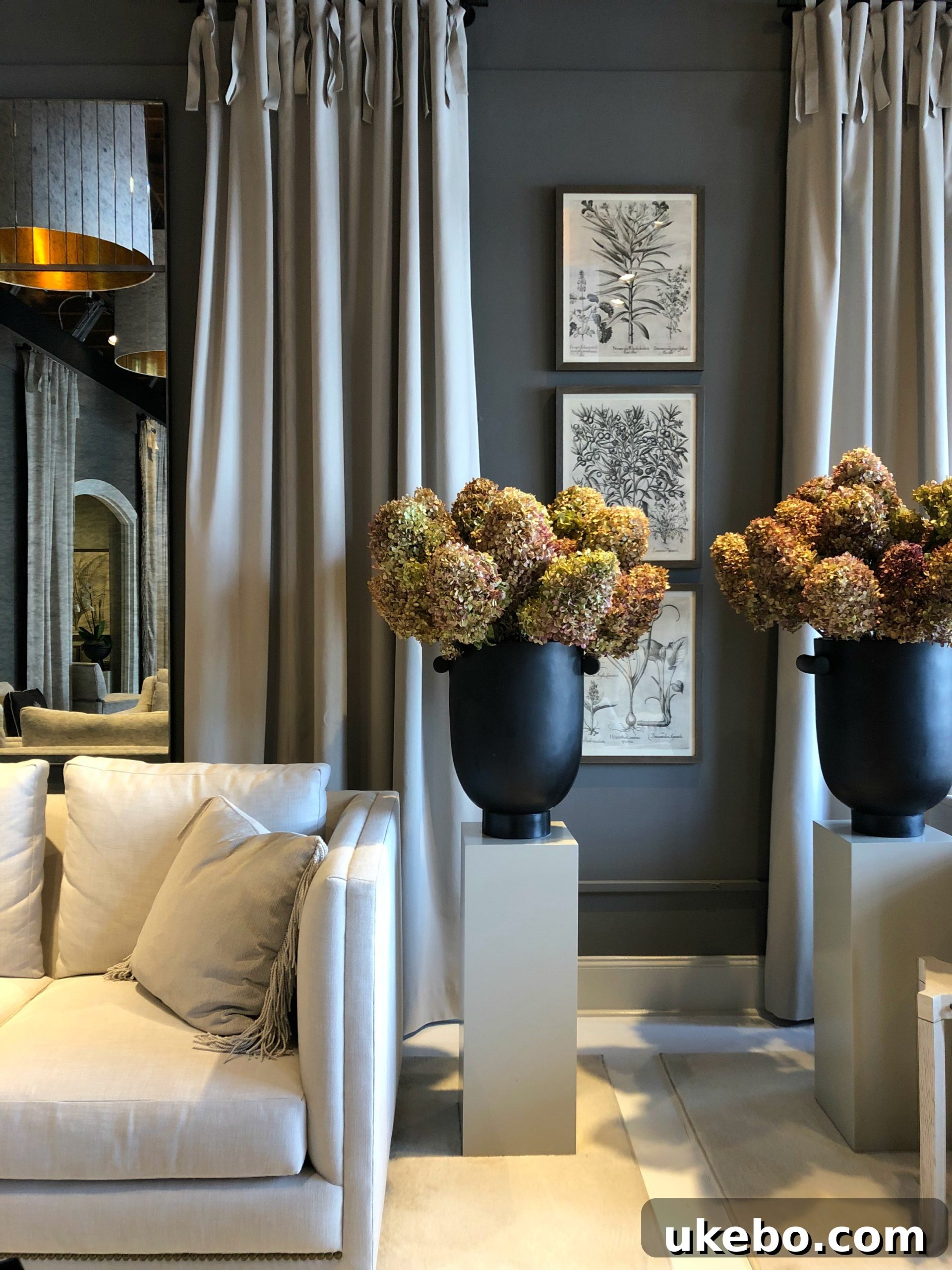 Luxurious and handcrafted furniture from E.J. Victor showroom at High Point Market, showcasing traditional and transitional styles.