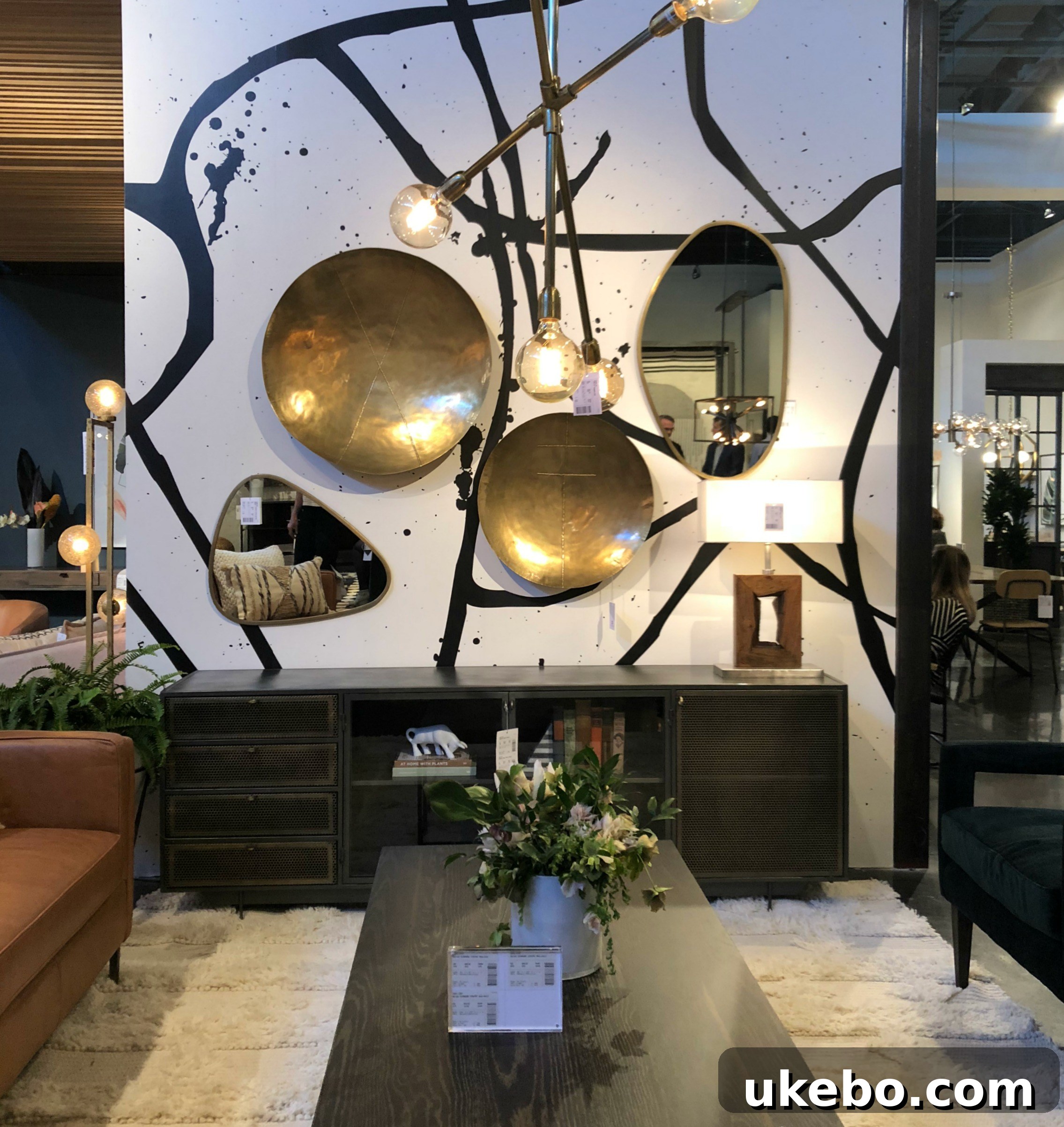 Unique, artisan-crafted furniture and decor from Four Hands at High Point Market, emphasizing natural materials.