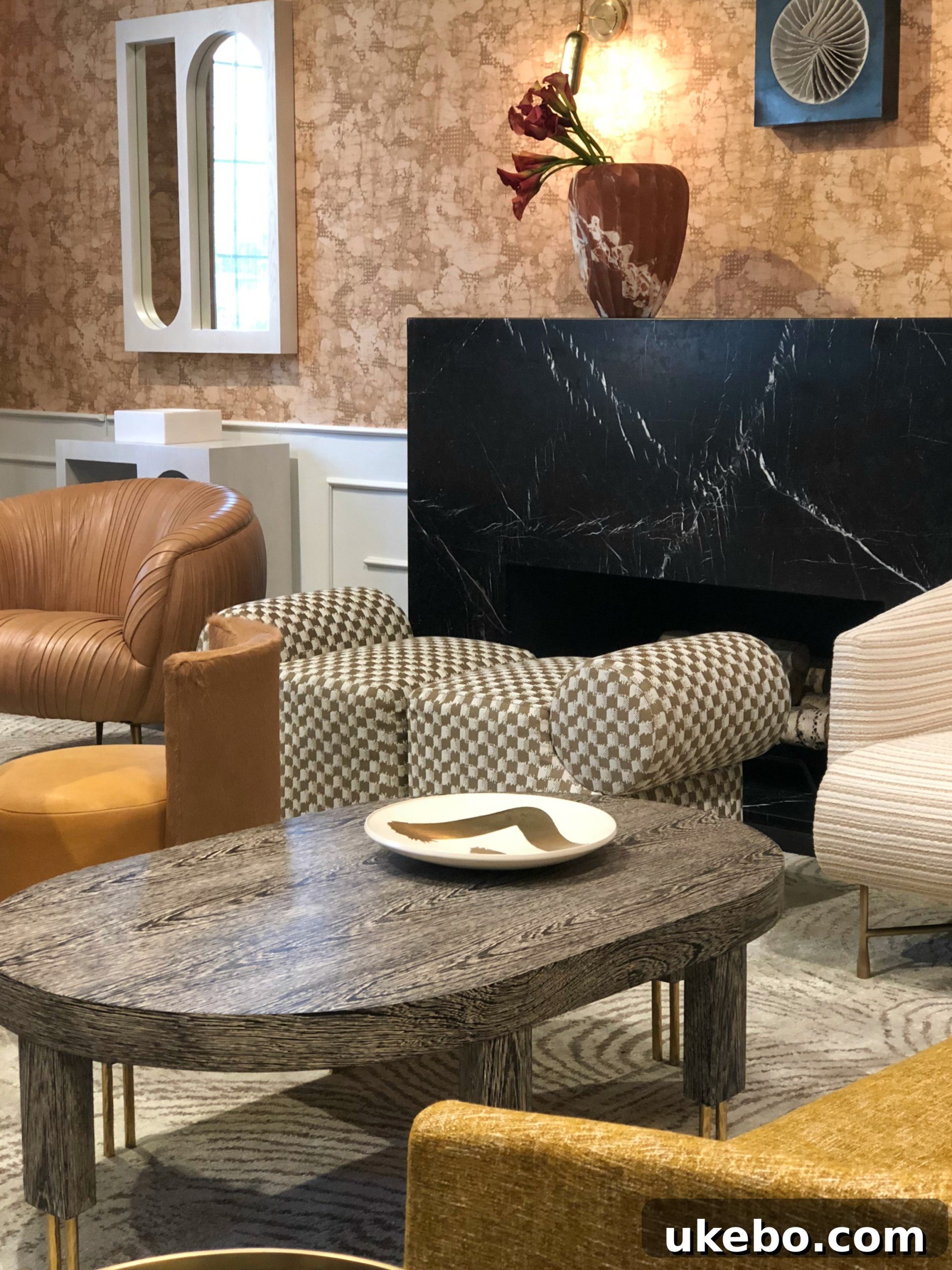 Another view of Kelly Wearstler's curved design furniture at EJ Victor, highlighting innovative and elegant forms.