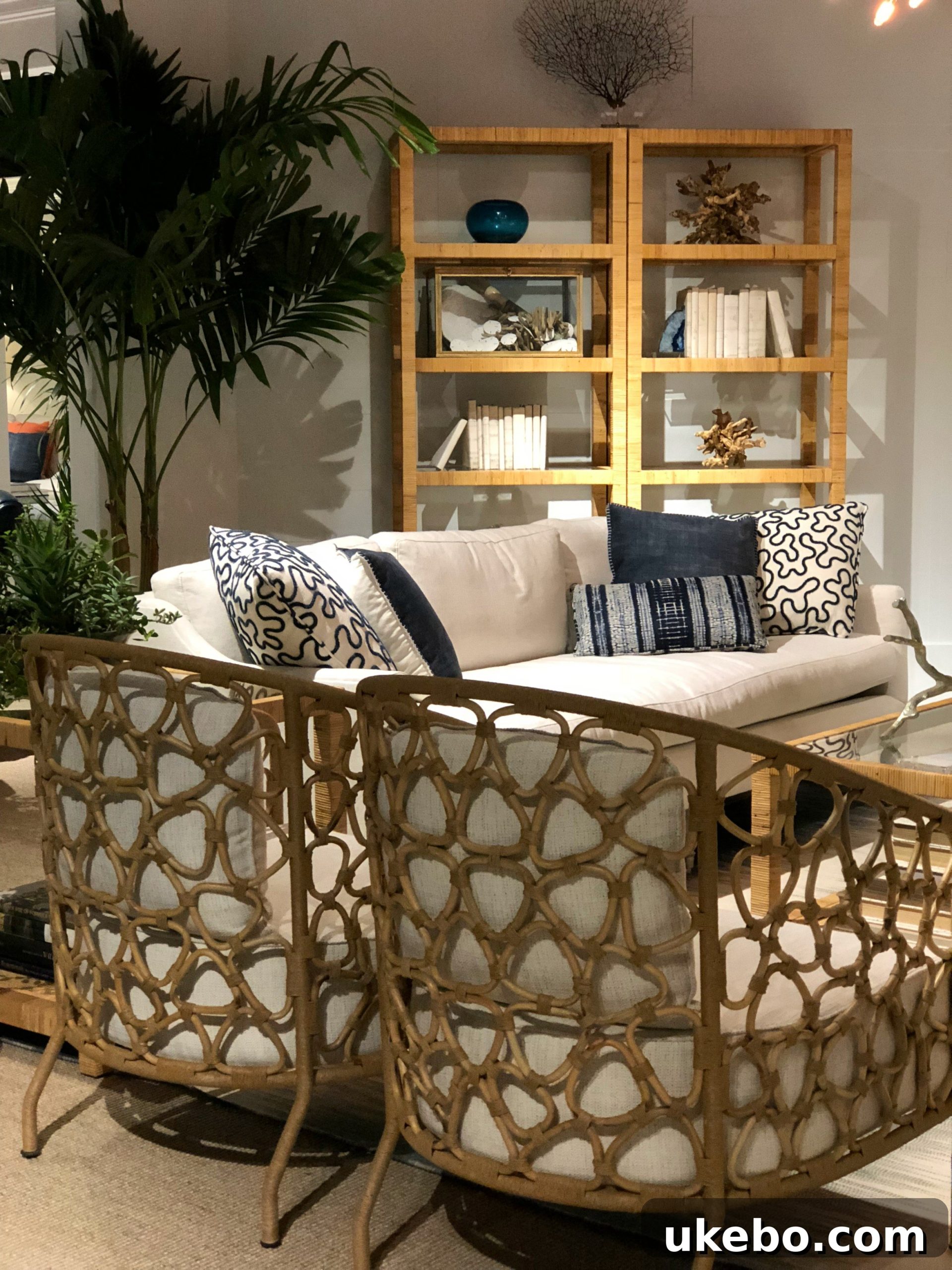 Curved upholstery piece from Universal Furniture, offering soft and inviting aesthetics and adaptability to various styles.