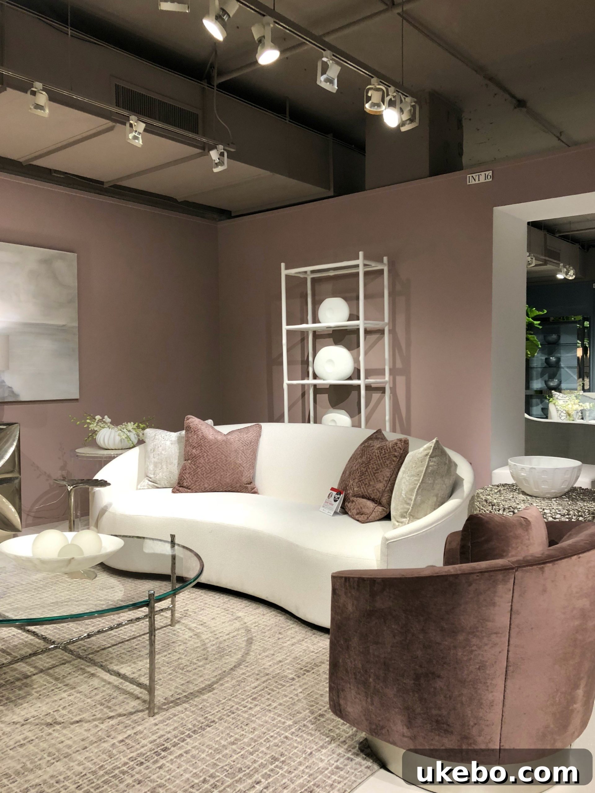 Beautifully crafted curved upholstered chair by Bernhardt, showcasing elegant lines and refined sophistication.