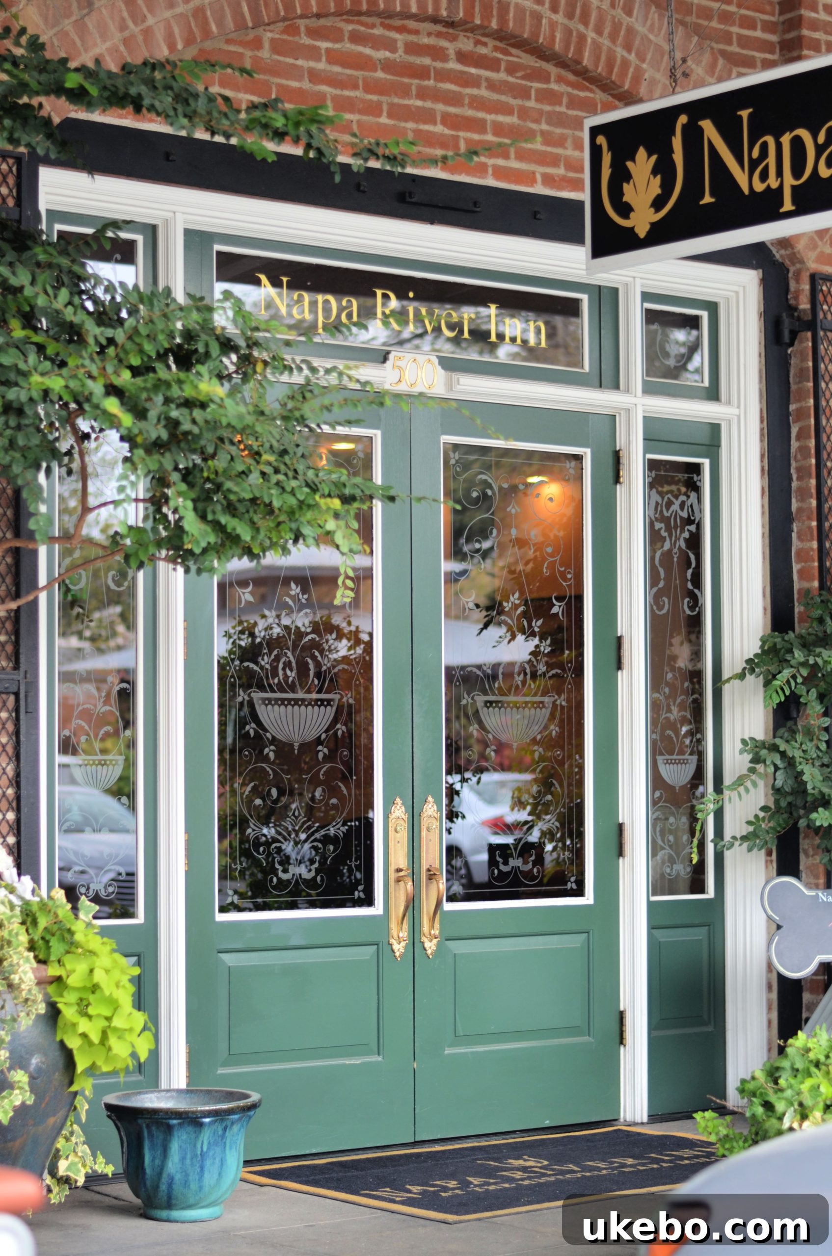 Elegant lobby area of Napa River Inn, showcasing comfortable seating and sophisticated design.