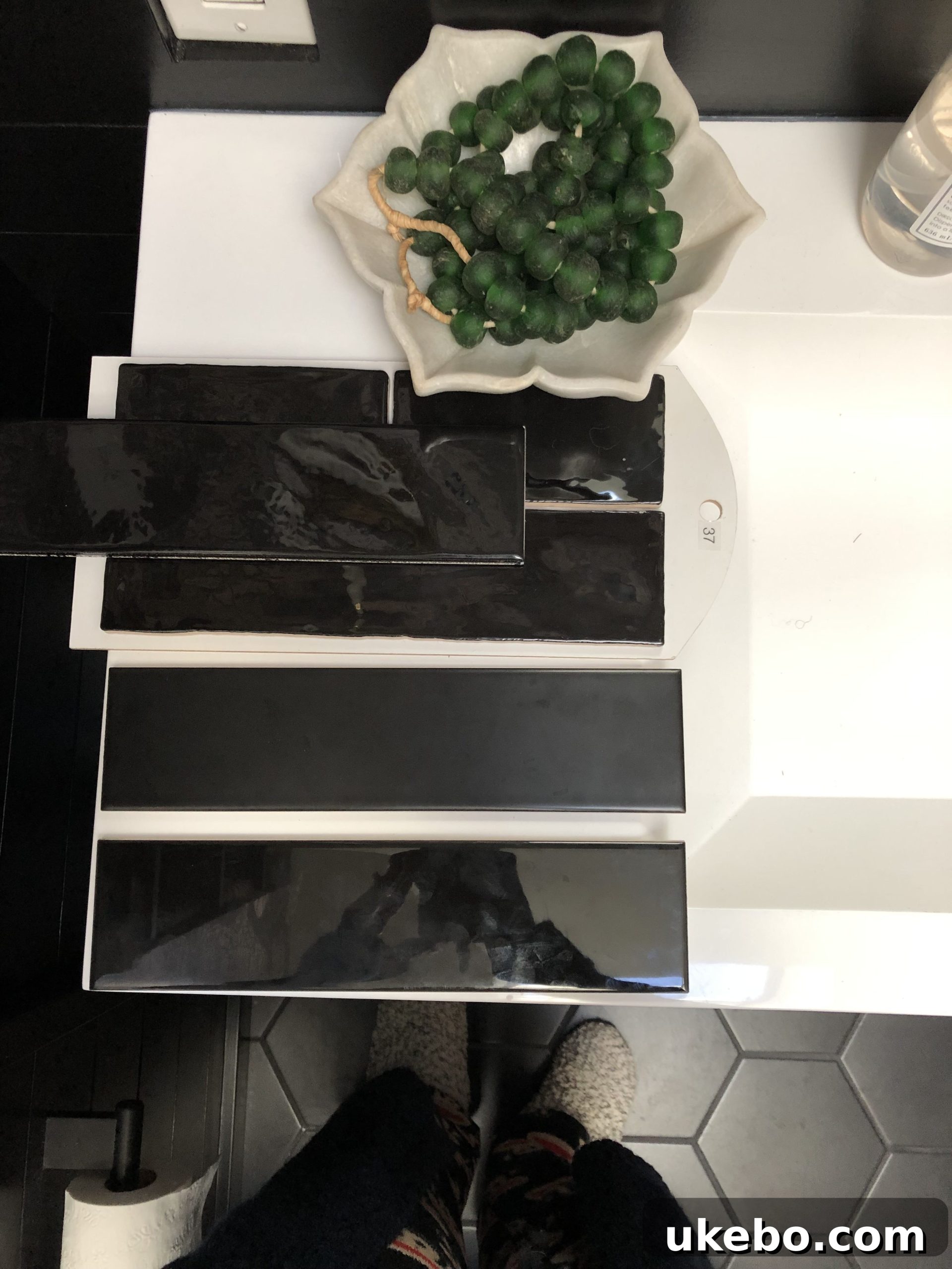 Chosen black tile sample in a home bathroom setting