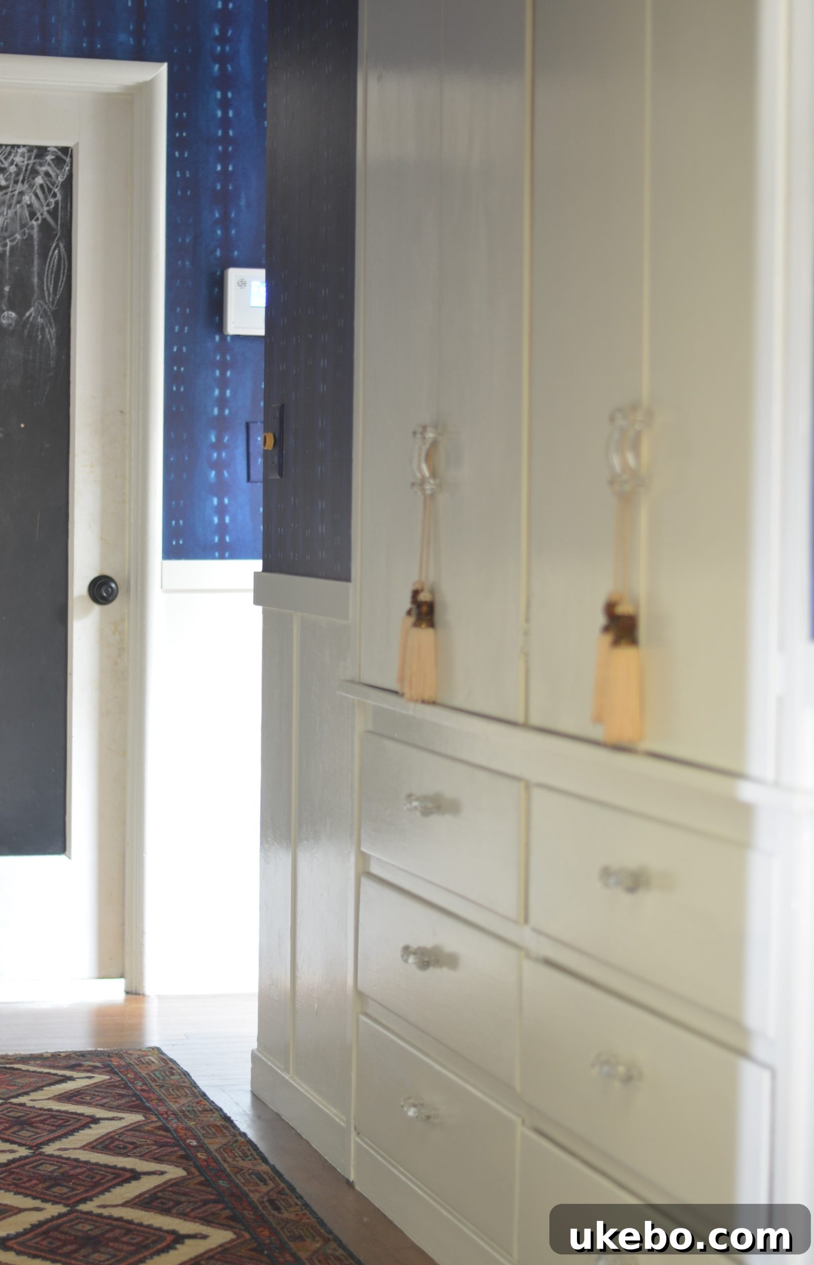 The hallway with the new rug, showing its inviting presence and overall design impact