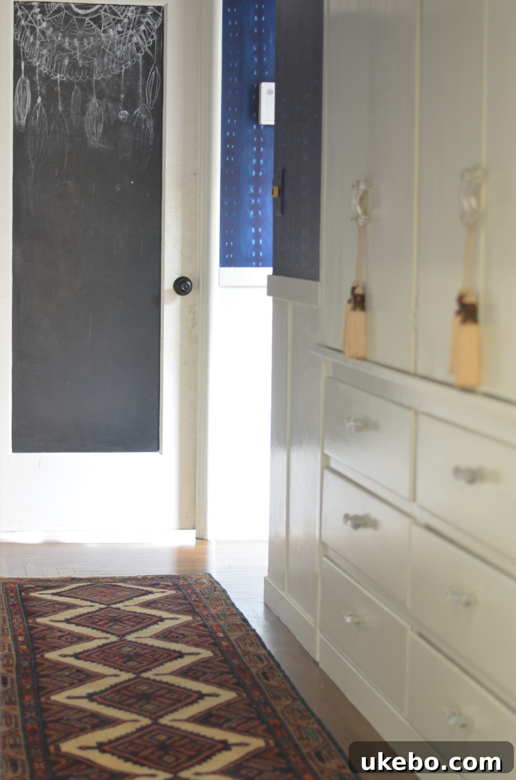 Close-up view of the vintage rug, highlighting its texture and depth