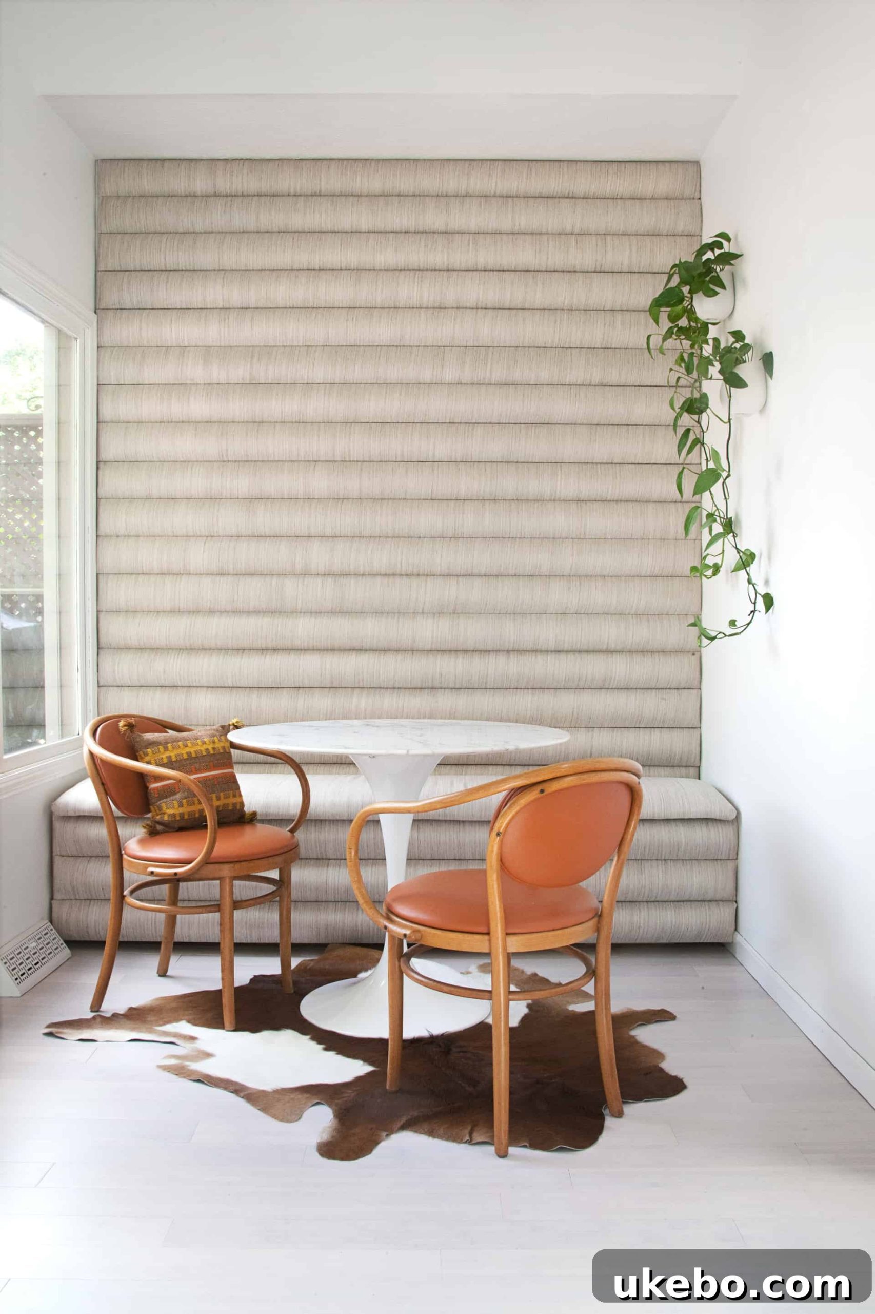 Stylish channel tufted sofa in a bright living room with warm lighting, demonstrating horizontal channels.